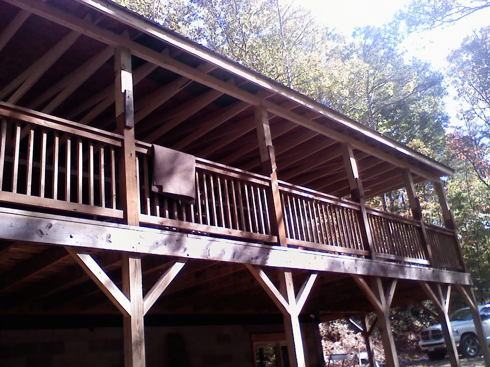 Timber framing under a new elevated porch and deck — Roof Leak Repair in Crandall by Roofing Brothers